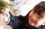 Girl Decorating Christmas Tree