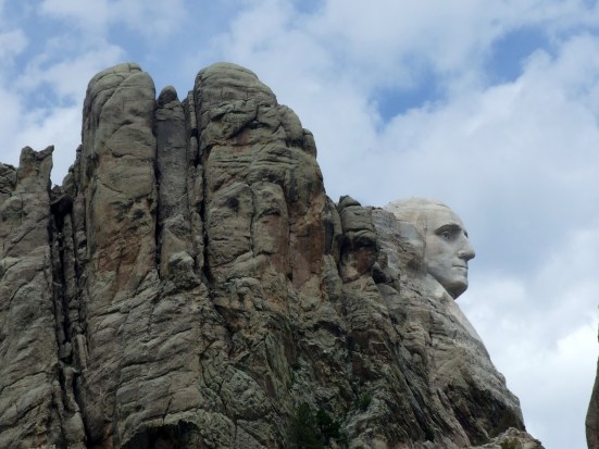 I took lots of photos of Mount Rushmore, but I chose this one in particular to show how the sculpted face of George Washington fits in with the surrounding rock face. South Dakota