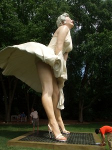 Marilyn towers over my husband who couldn't help but look up her dress. Another guest appears to be bowing to her. What is this power Marilyn has???